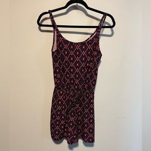 Medium pink and black romper/ lightly worn